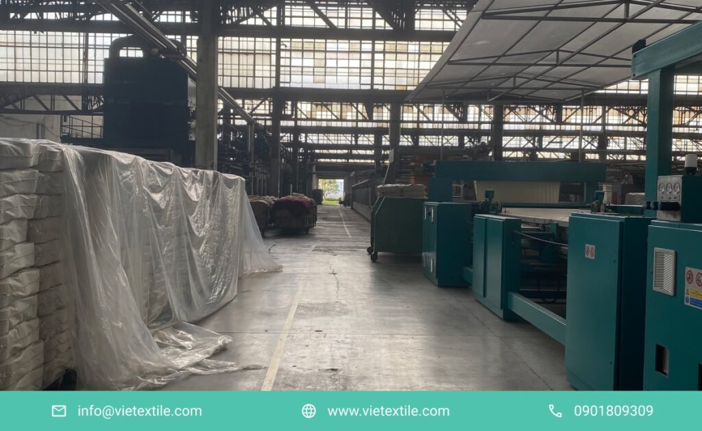 Nhà máy có máy định hình vải khổ lớn | large-format fabric finishing machine.