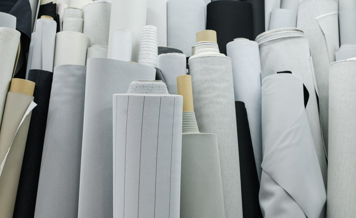 100%纯棉针织面料生产与棉/涤混纺面料对比